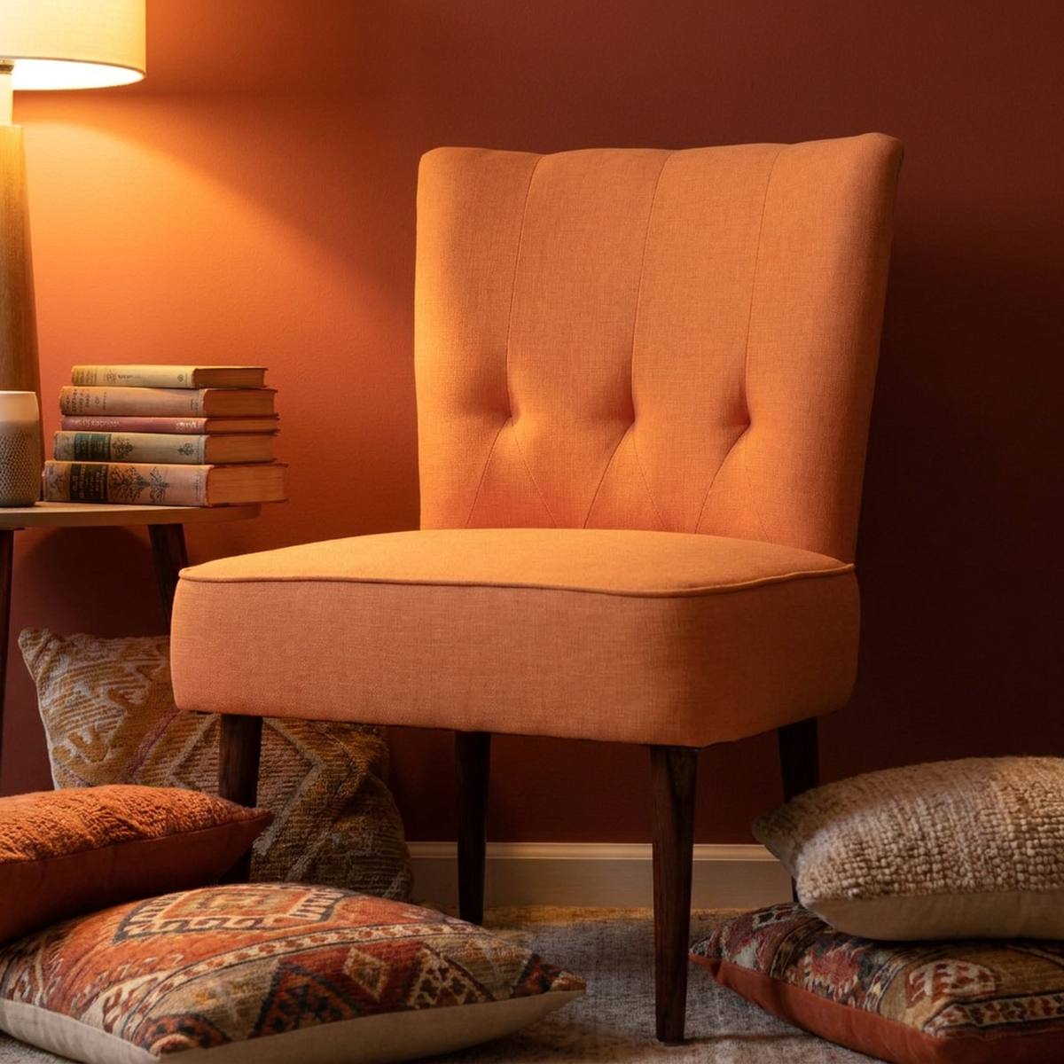 Orange slipper chair with side table