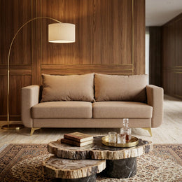 Beige three seater sofa styled view