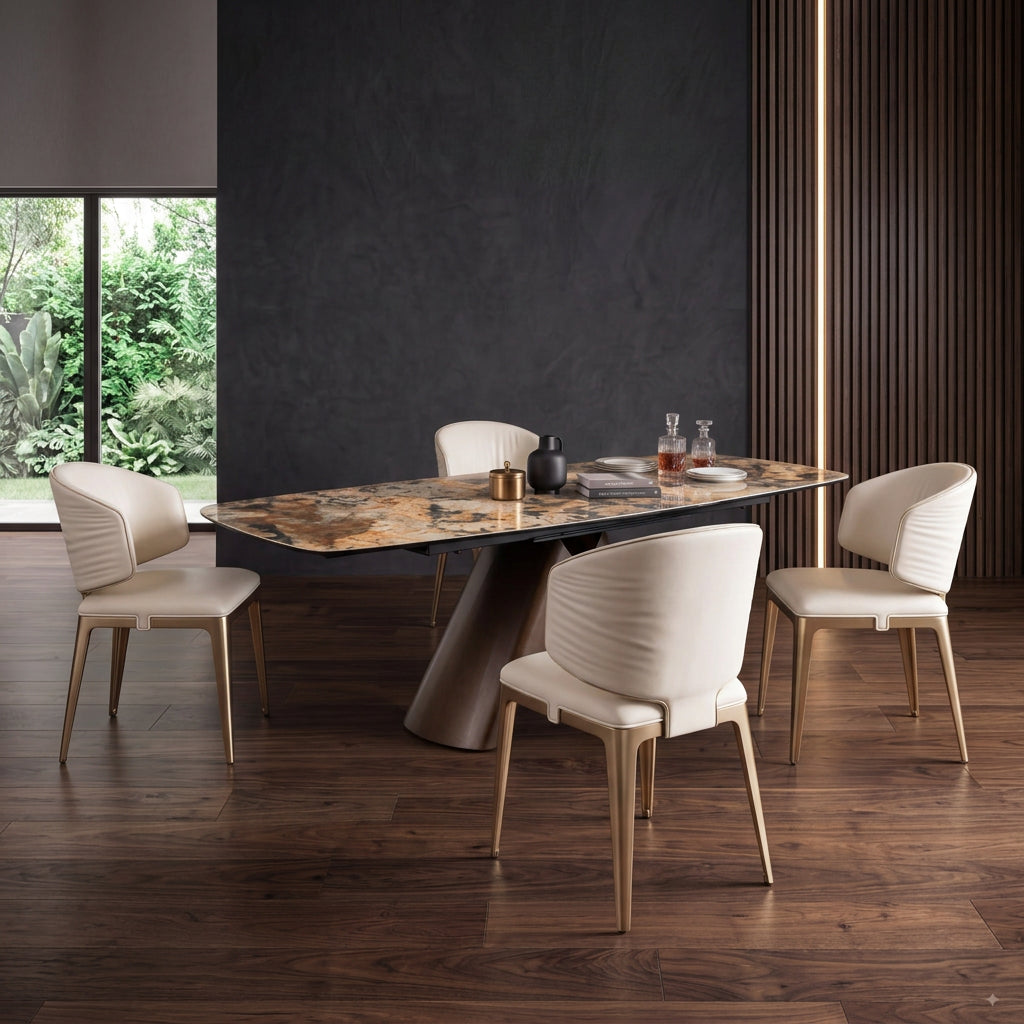 Four cream leather dining chairs around a luxury stone-top dining table