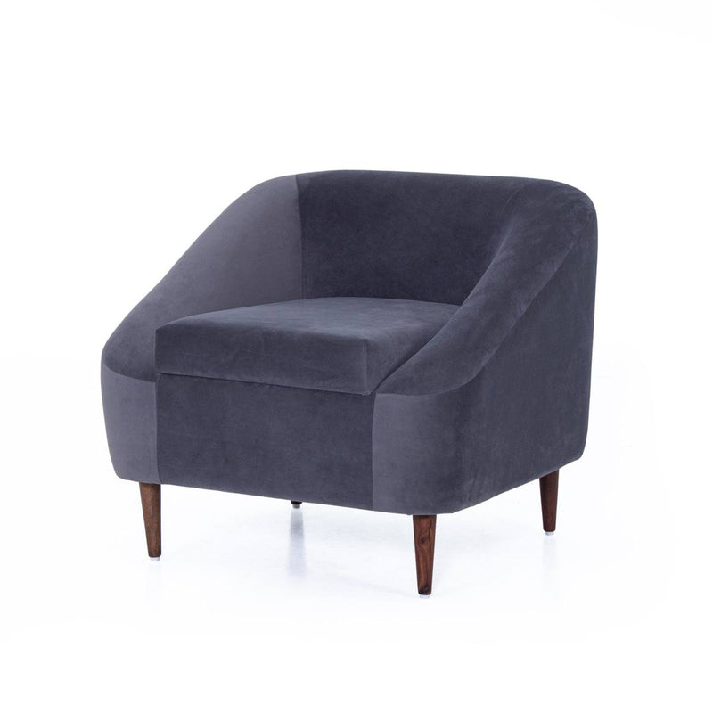 Charcoal grey velvet lounge chair angled studio shot