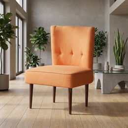 Orange slipper chair near a window