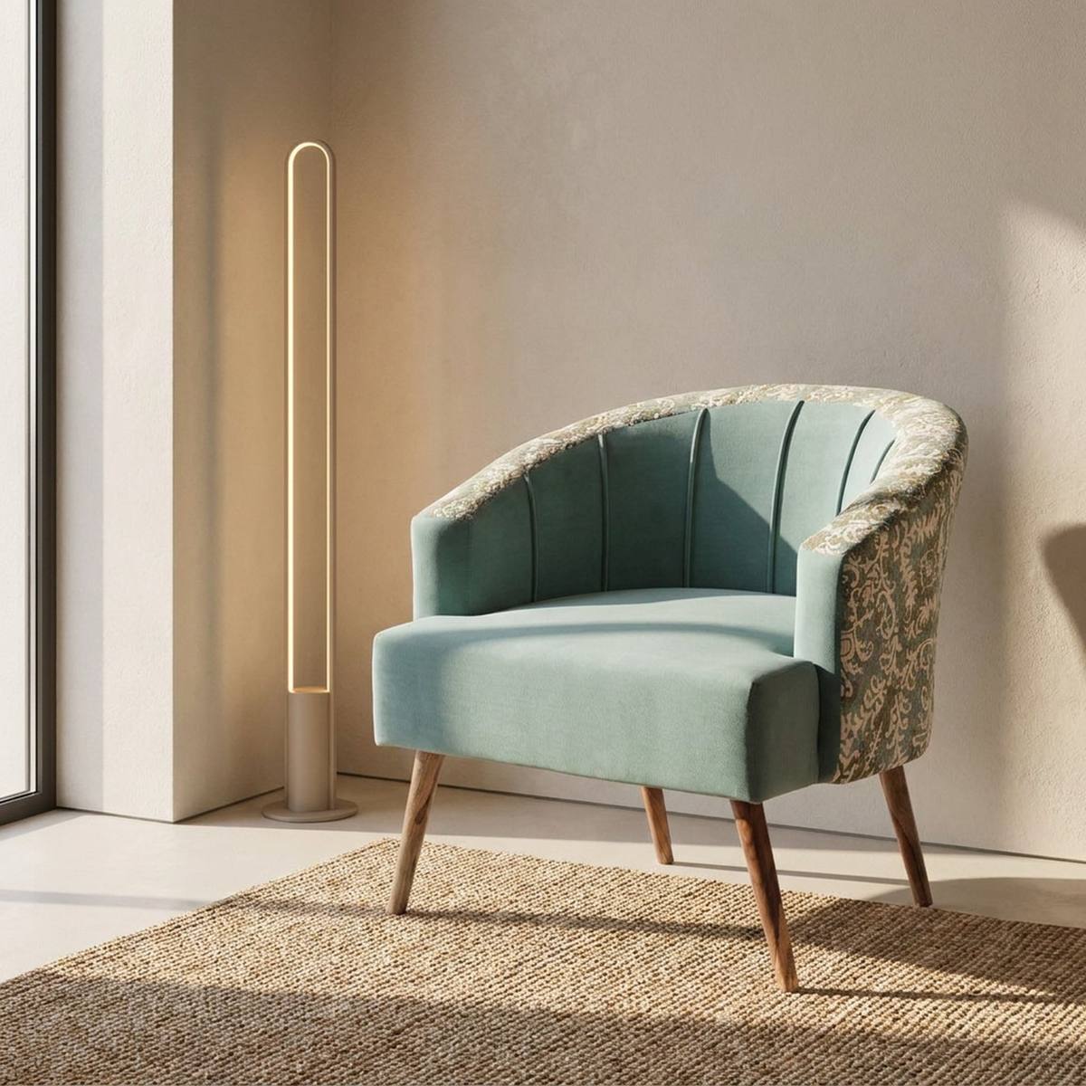 Teal accent chair with printed back beside a plant