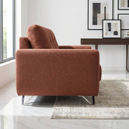 Rust brown 2 seater sofa in an apartment living room