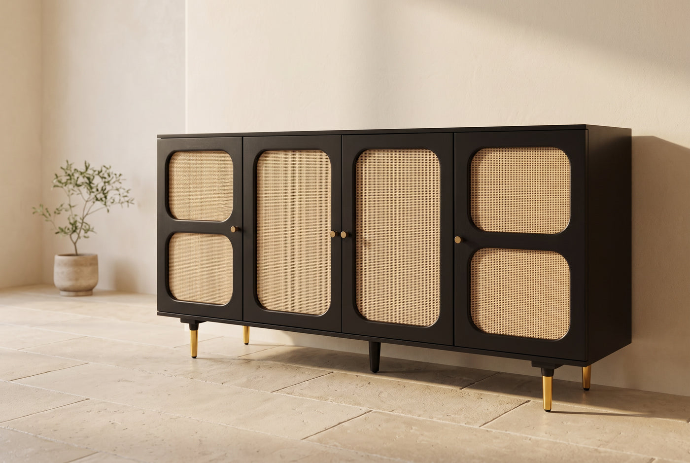Angled view of the black and cane sideboard in a sunlit room