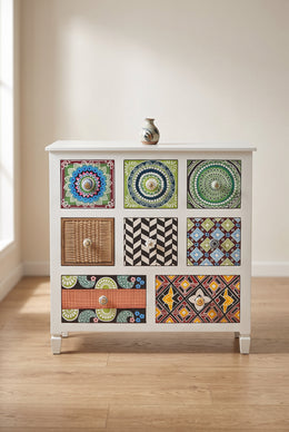 White eight drawer tile print chest of drawers in a bright room