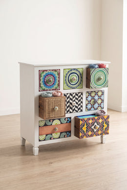 Tile print chest with drawers open showing folded clothes