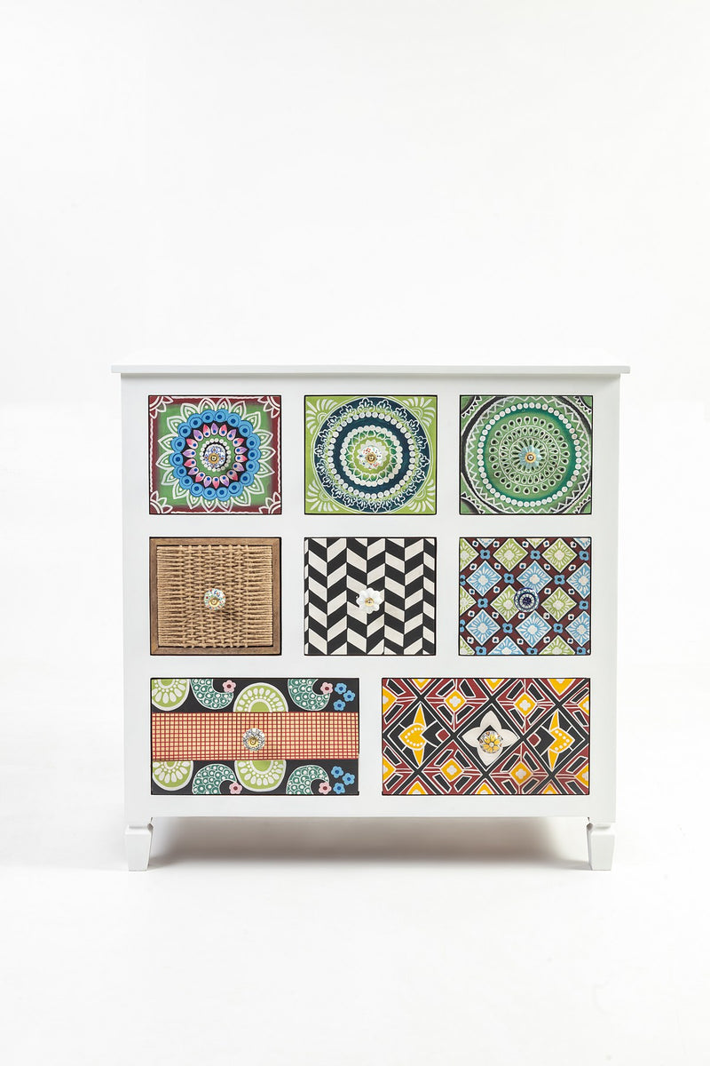 White eight drawer tile print chest front view on plain background